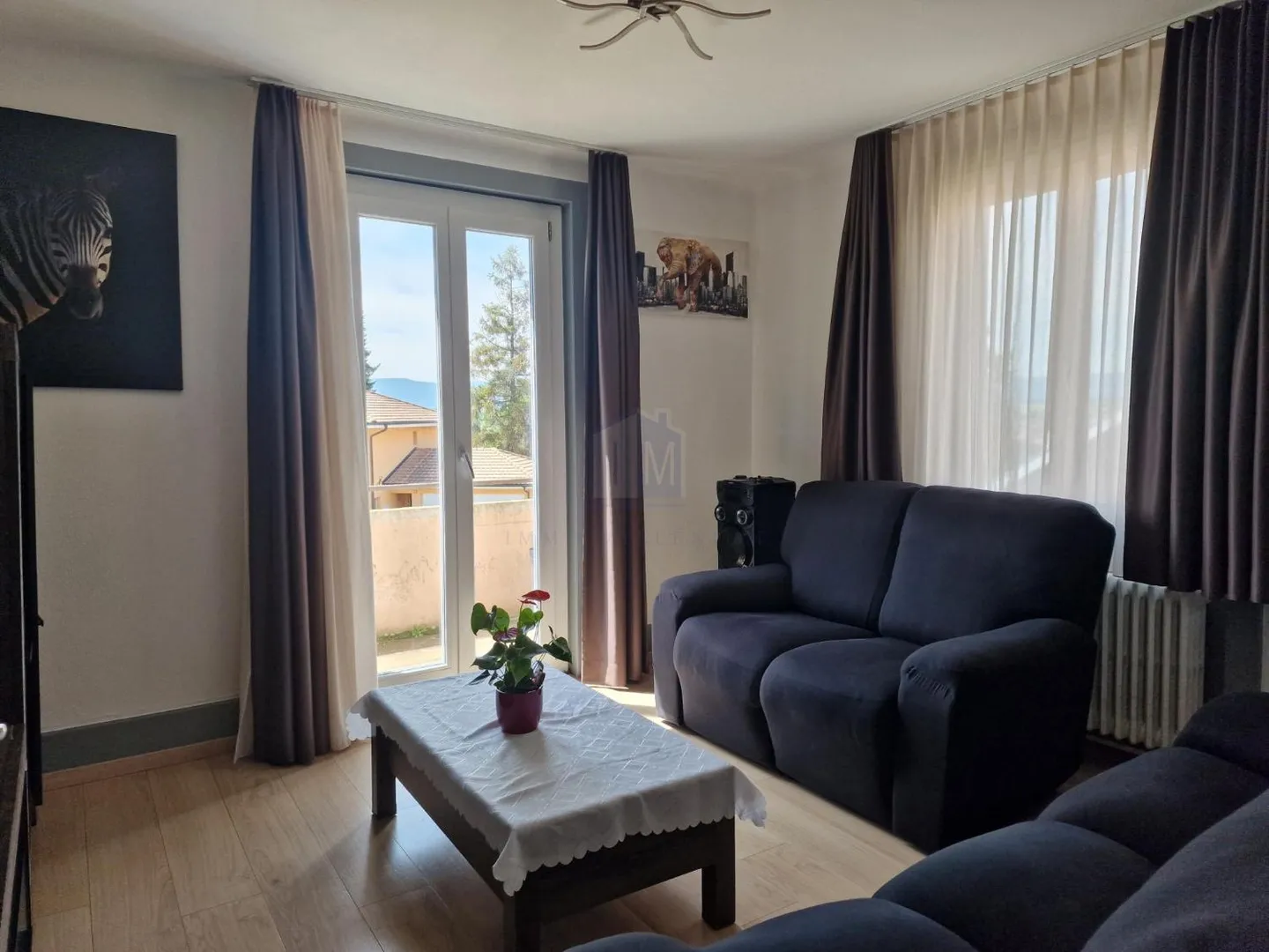 Un appartement avec un bon rendement, sympathique et idéalement situé - Photo 3 sur 9