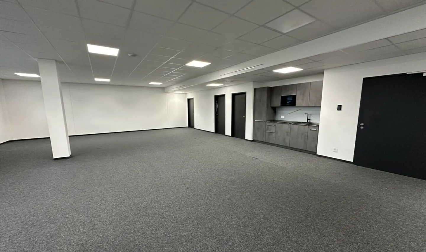 Welcome to the modern workspace with a view of greenery! - Photo 3 of 6