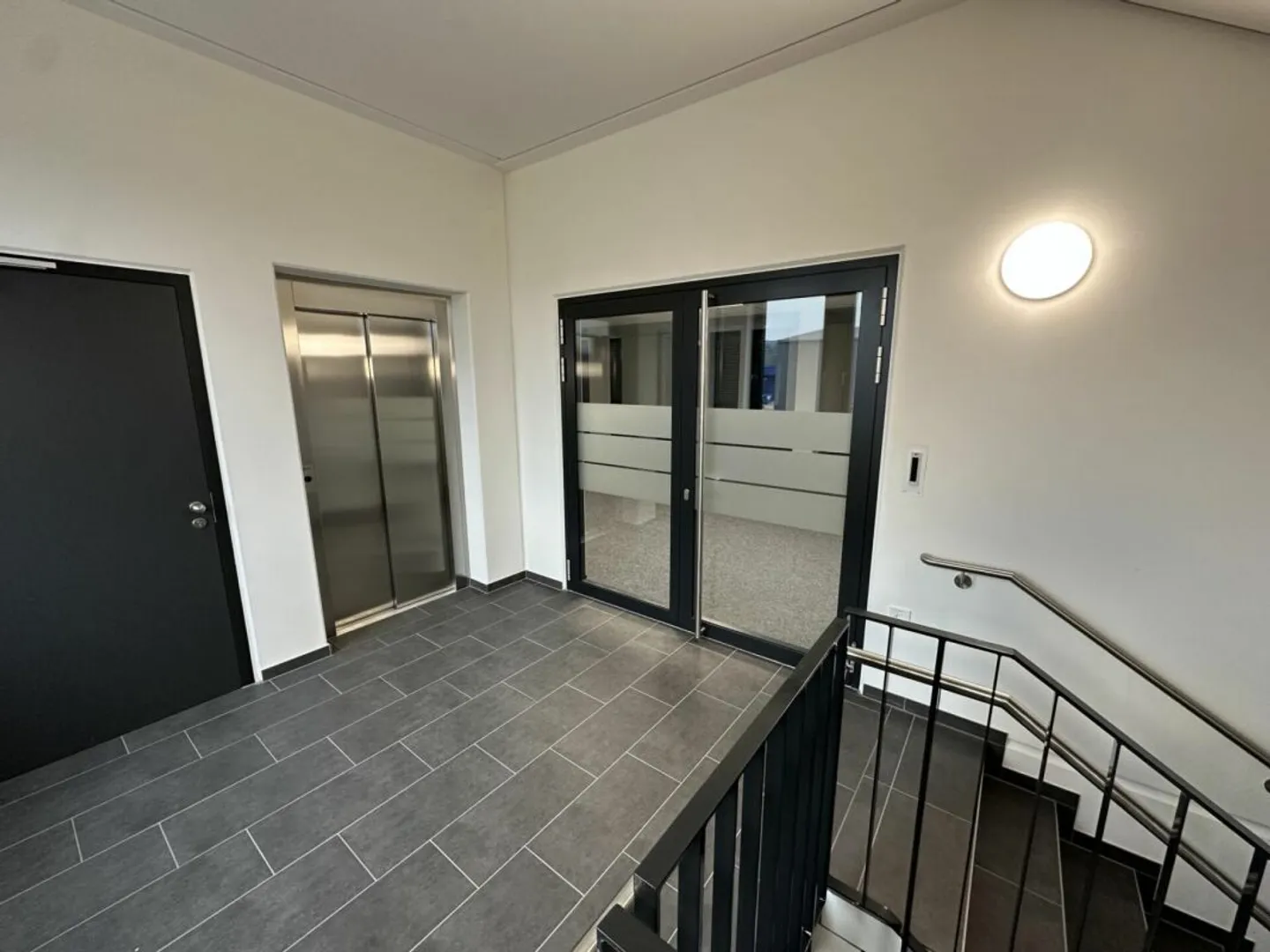 Welcome to the modern workspace with a view of greenery! - Photo 6 of 6