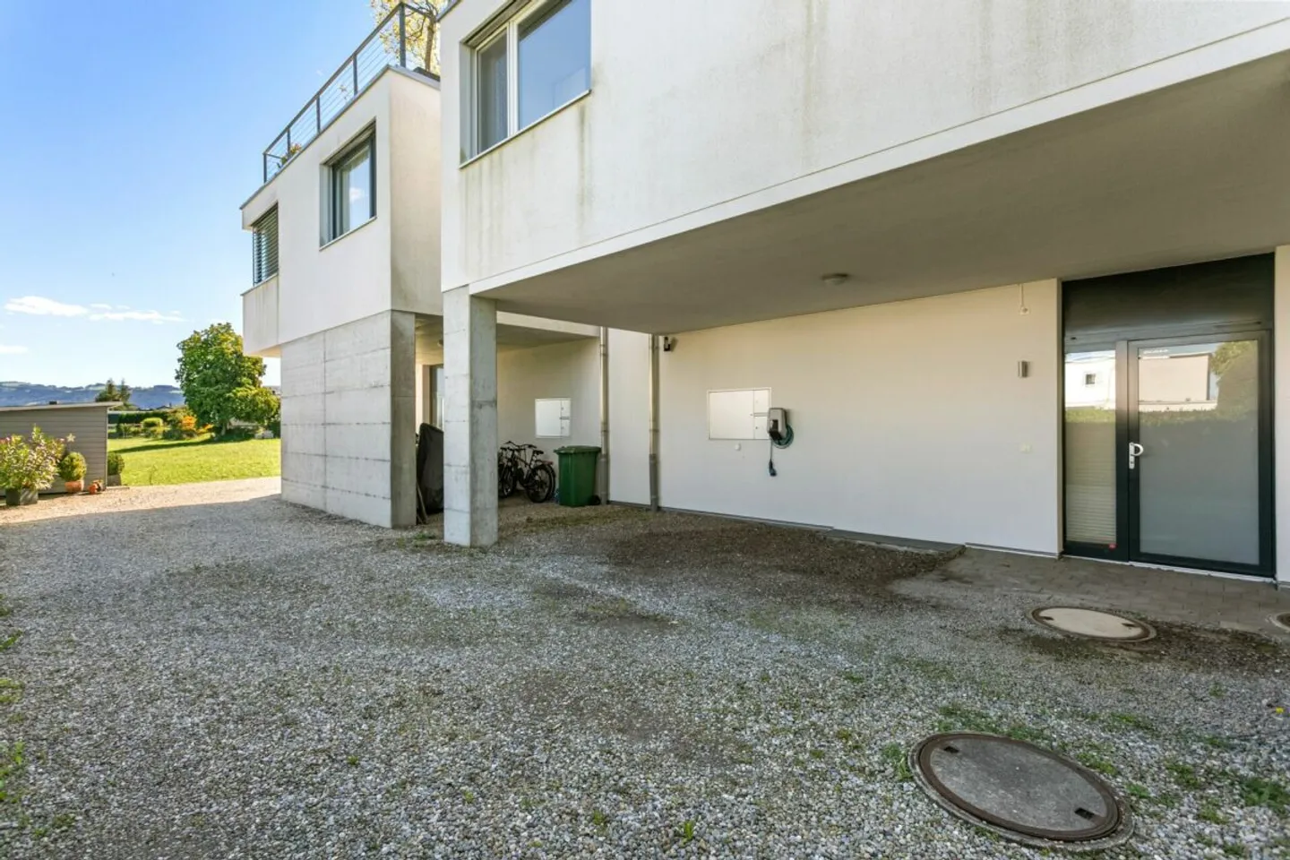 Modern Family Home with Lake View and Garden - Photo 30 of 31