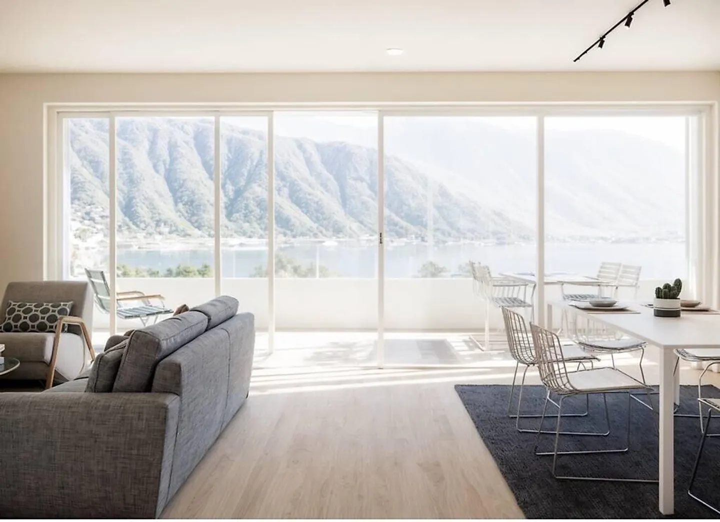 SUPER ATTICO DUPLEX 6.5 VISTA LAGO IN COSTRUZIONE A MELIDE - Photo 1 of 11