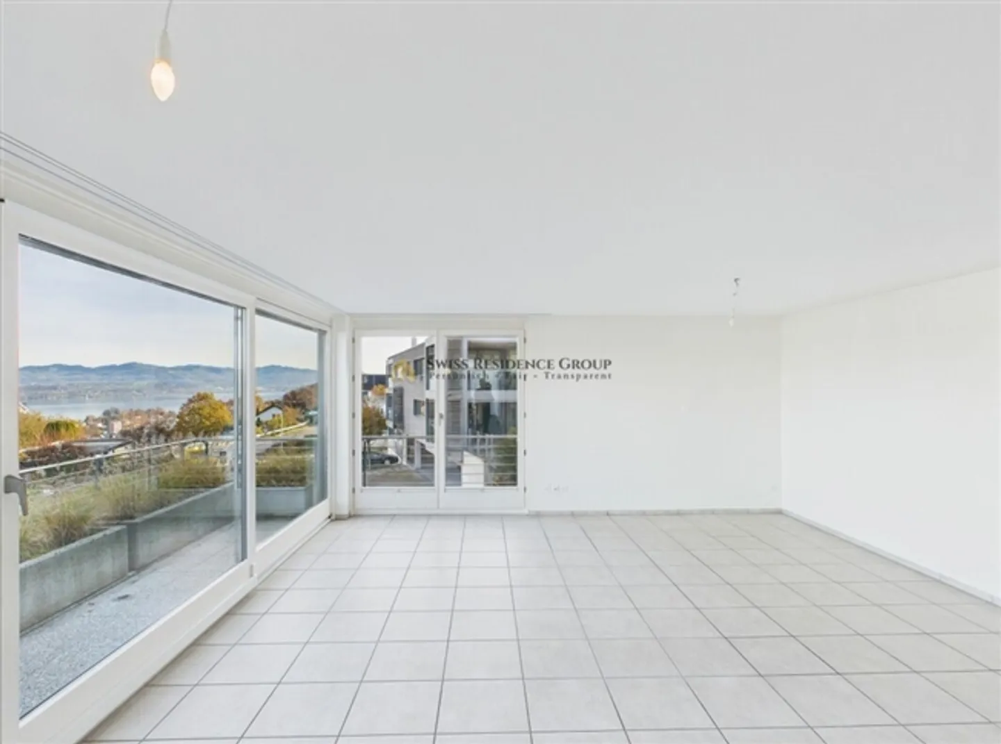 Vivere con vista: Appartamento terrazza da sogno di 6,5 stanze con vista lago a Wollerau - Foto 5 di 20