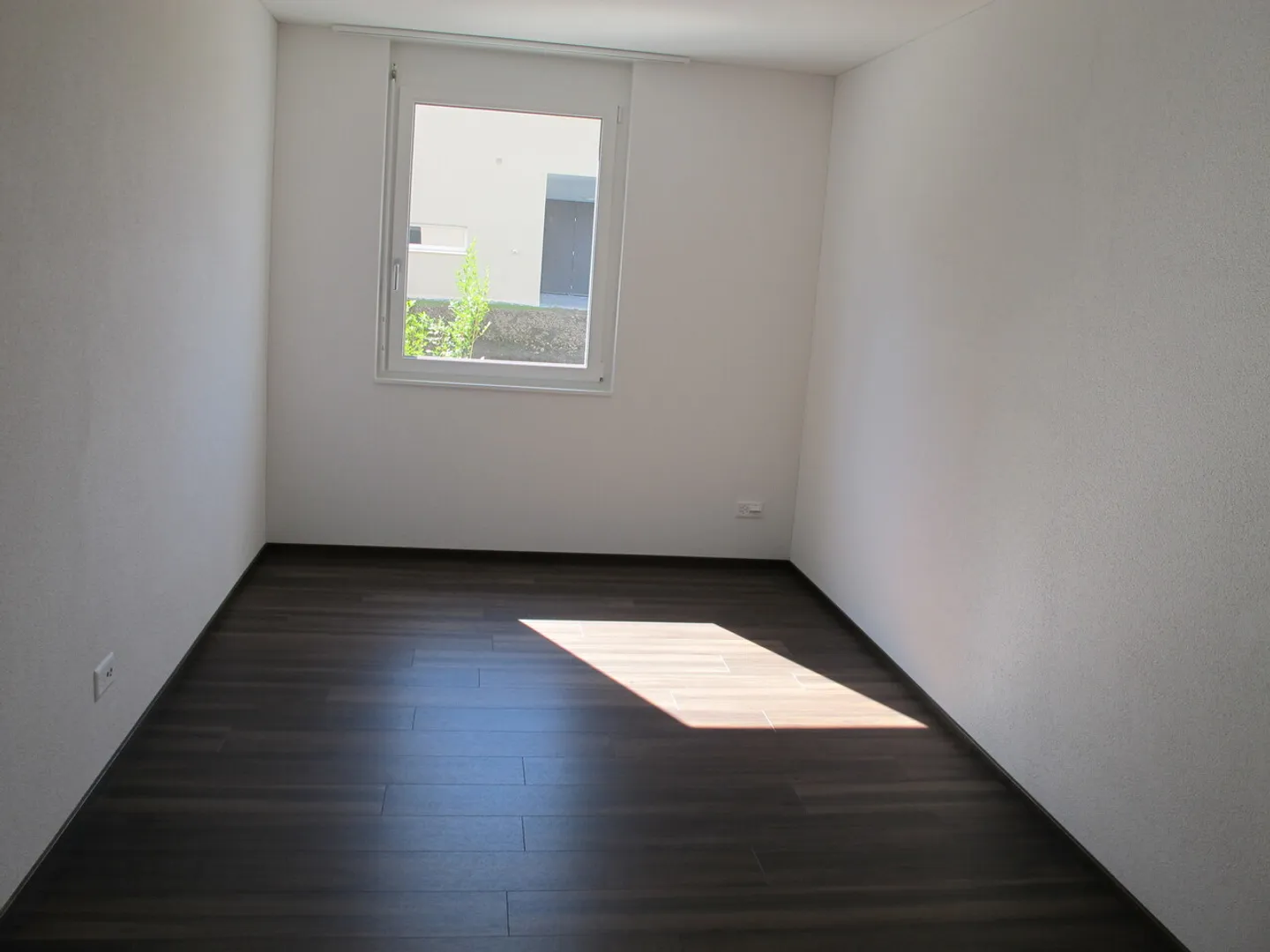 2.5-Zimmerwohnung im EG mit Gartensitzplatz - Foto 3 von 4