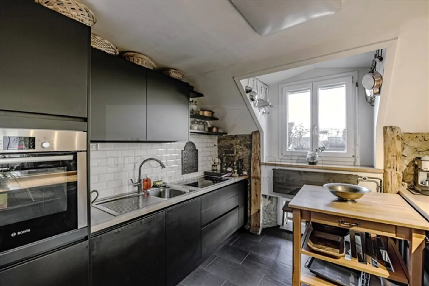 Au cœur de la ville, caractère, volume et sauna - Photo 1 sur 6