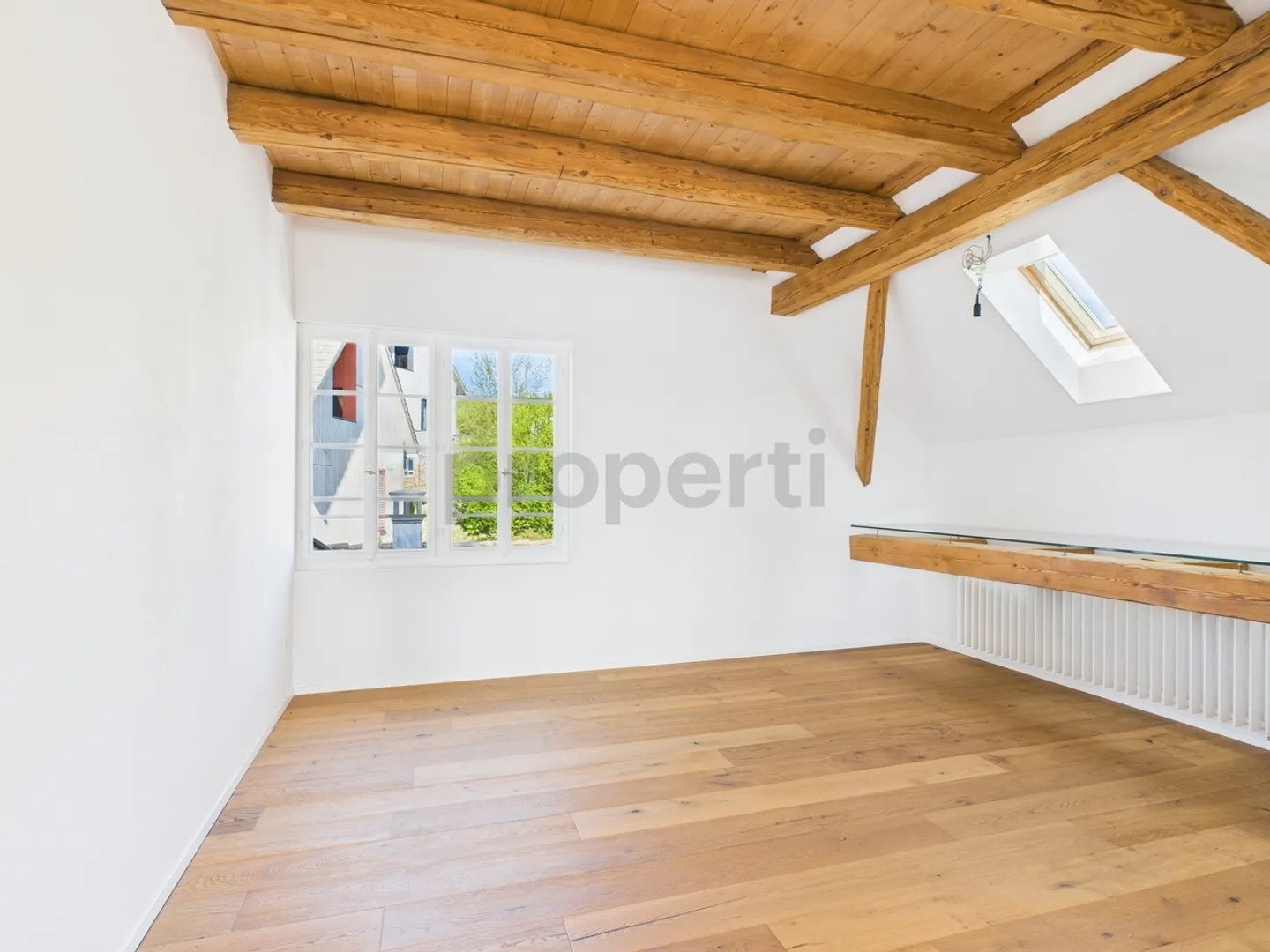 Appartement 2.5 pièces - un foyer unique qui allie histoire et modernité - Photo 2 sur 13