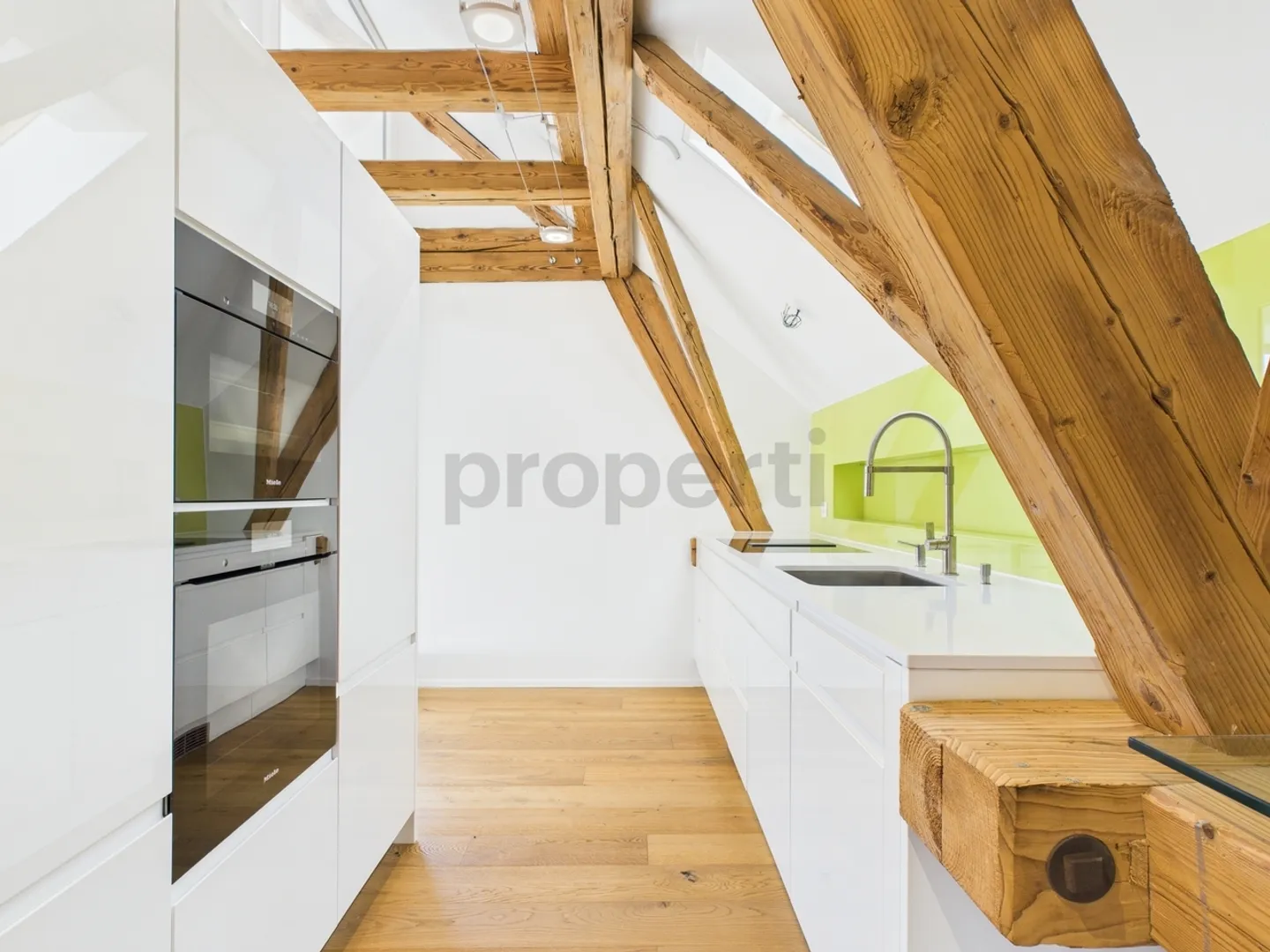 Appartement 2.5 pièces - un foyer unique qui allie histoire et modernité - Photo 6 sur 13