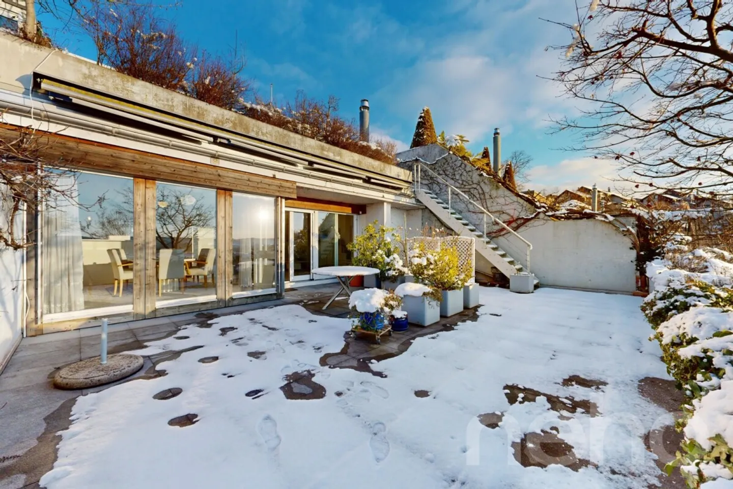 Appartement en terrasse sur deux niveaux avec jardin d'hiver et panorama - Photo 1 sur 12