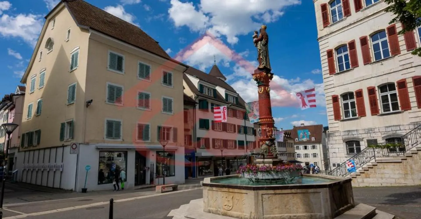 Unique Opportunity: Two Historic Buildings in the Heart of the Old Town of Delémont - Photo 2 of 6