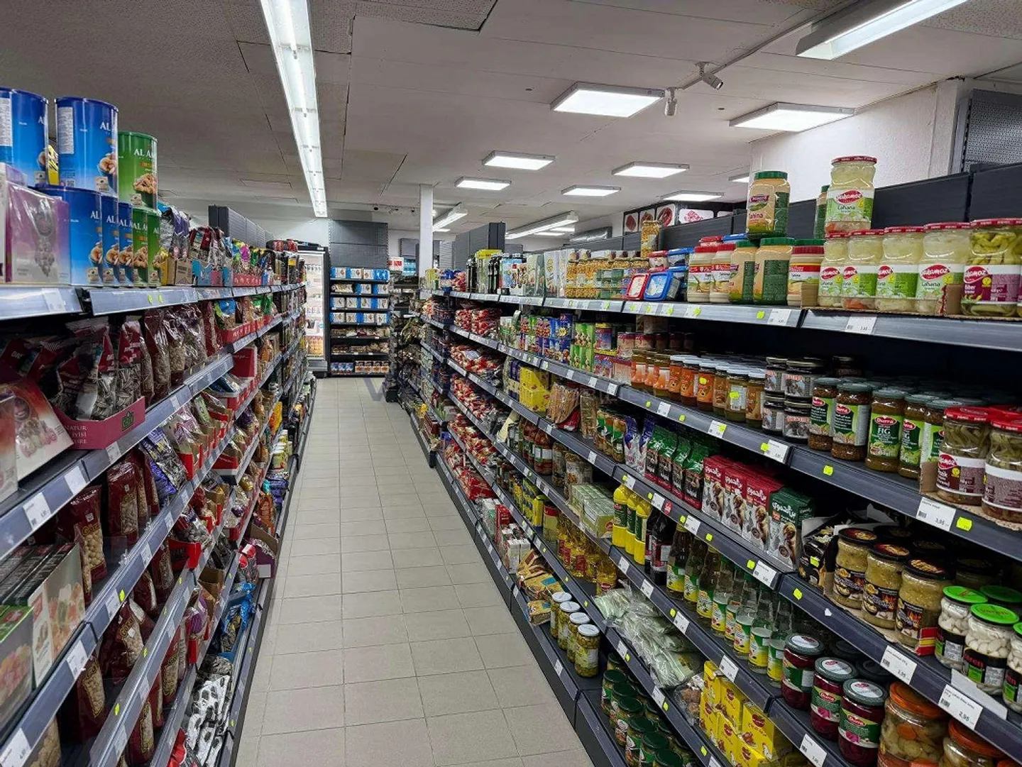 Eingeführter Quartierladen - Foto 4 von 9