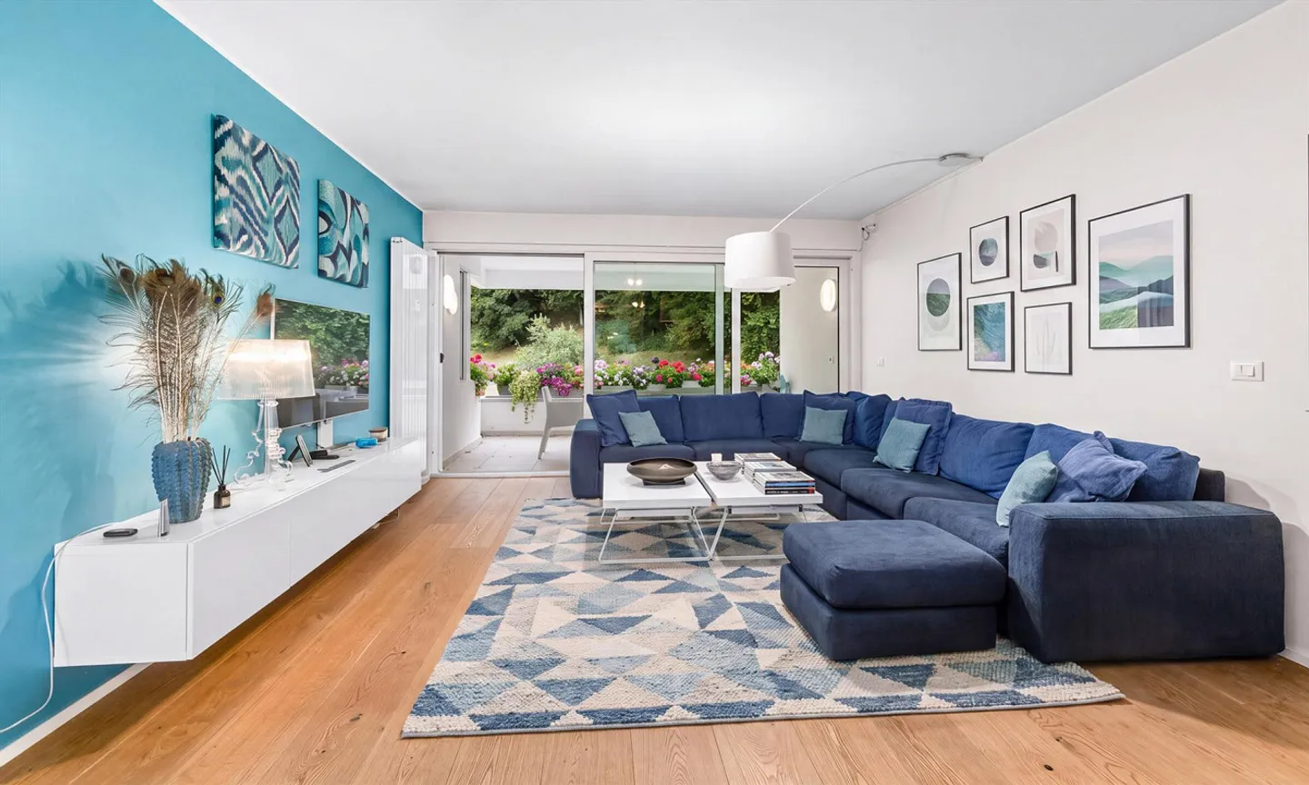 SPLENDID AND SPACIOUS 4.5 ROOMS WITH LAKE VIEW IN THE GREENERY IN CARONA - Photo 1 of 9