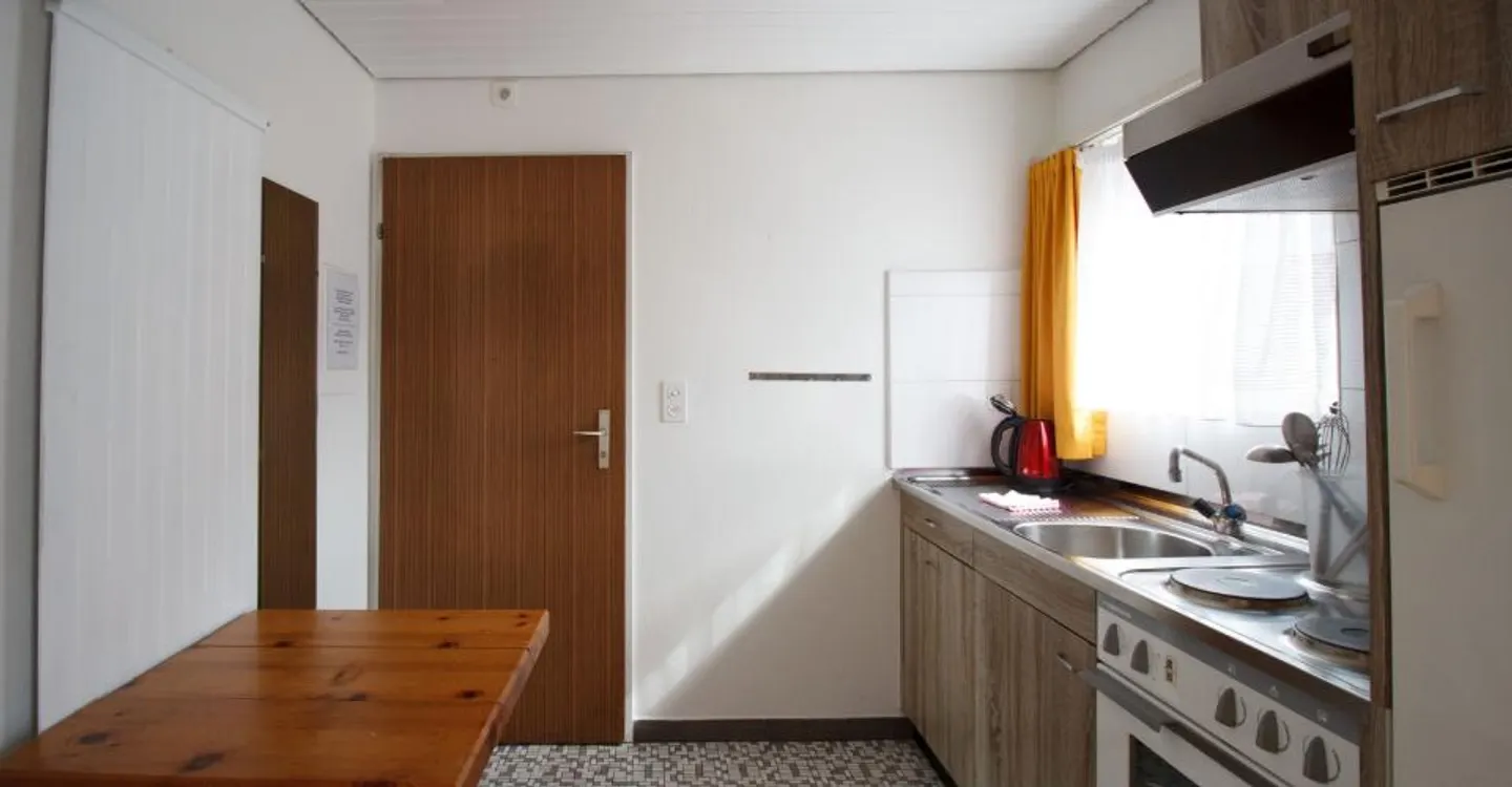 Studio 1.5-05, high-quality 1.5-room apartment with balcony and great view in the center - Photo 4 of 7