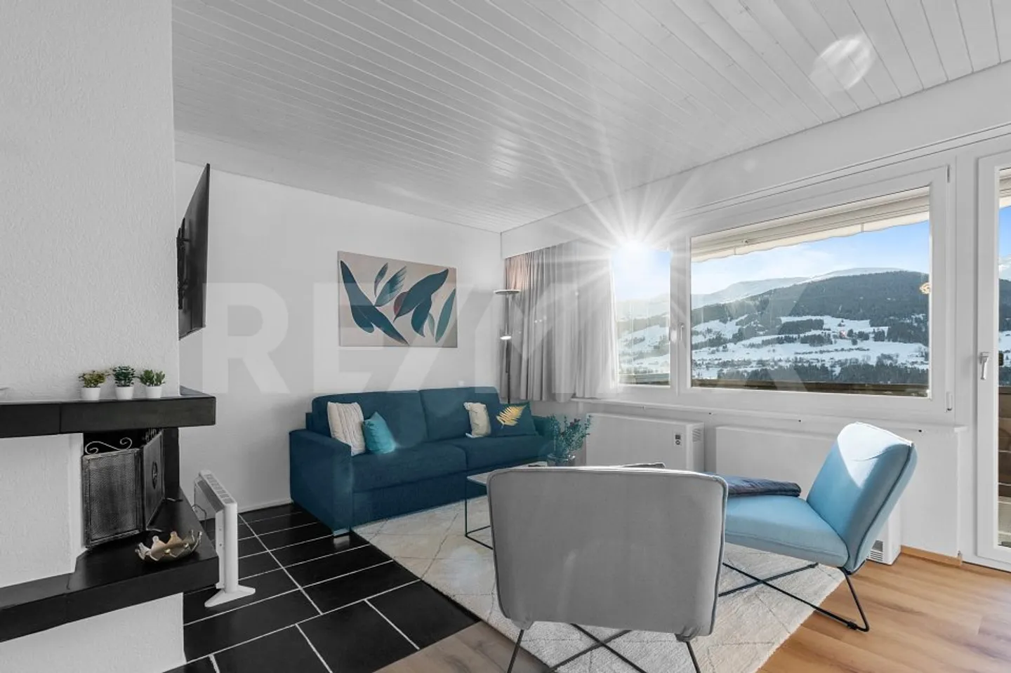 Charmante 2 ½ Zimmerwohnung mit bezaubernder Aussicht - Foto 2 von 13