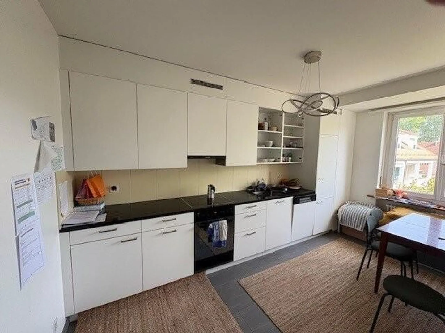 Renovated 2-room apartment in the village center of Riehen - Photo 4 of 5