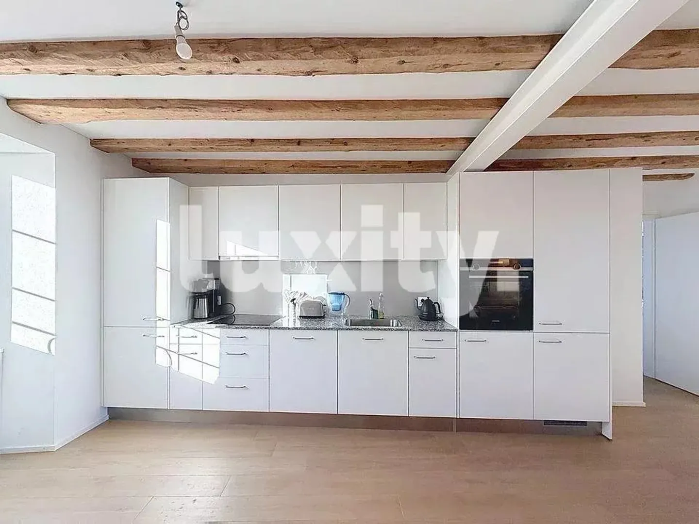 Geräumige Wohnung mit Terrasse - Foto 4 von 8