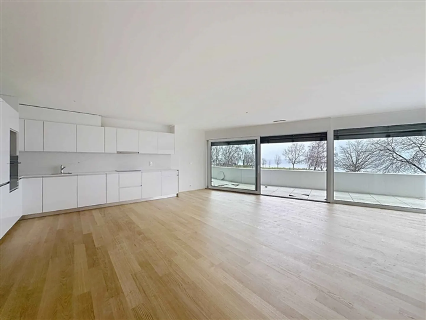 Magnifique appartement de 3.5 pièces avec terrasses couvertes, jardins et vue la - Photo 1 sur 13