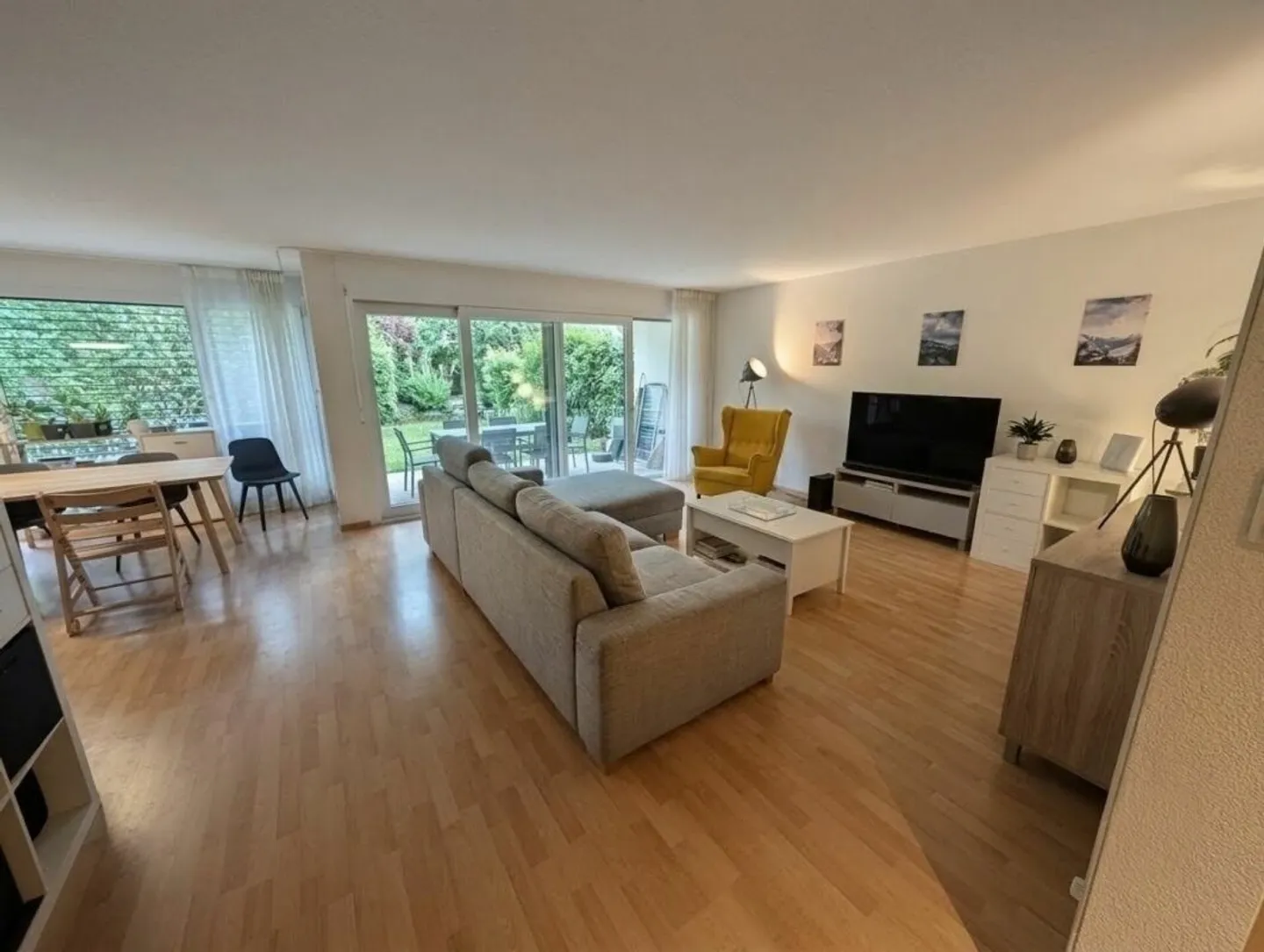 Geräumige Wohnung mit Garten - Foto 3 von 12