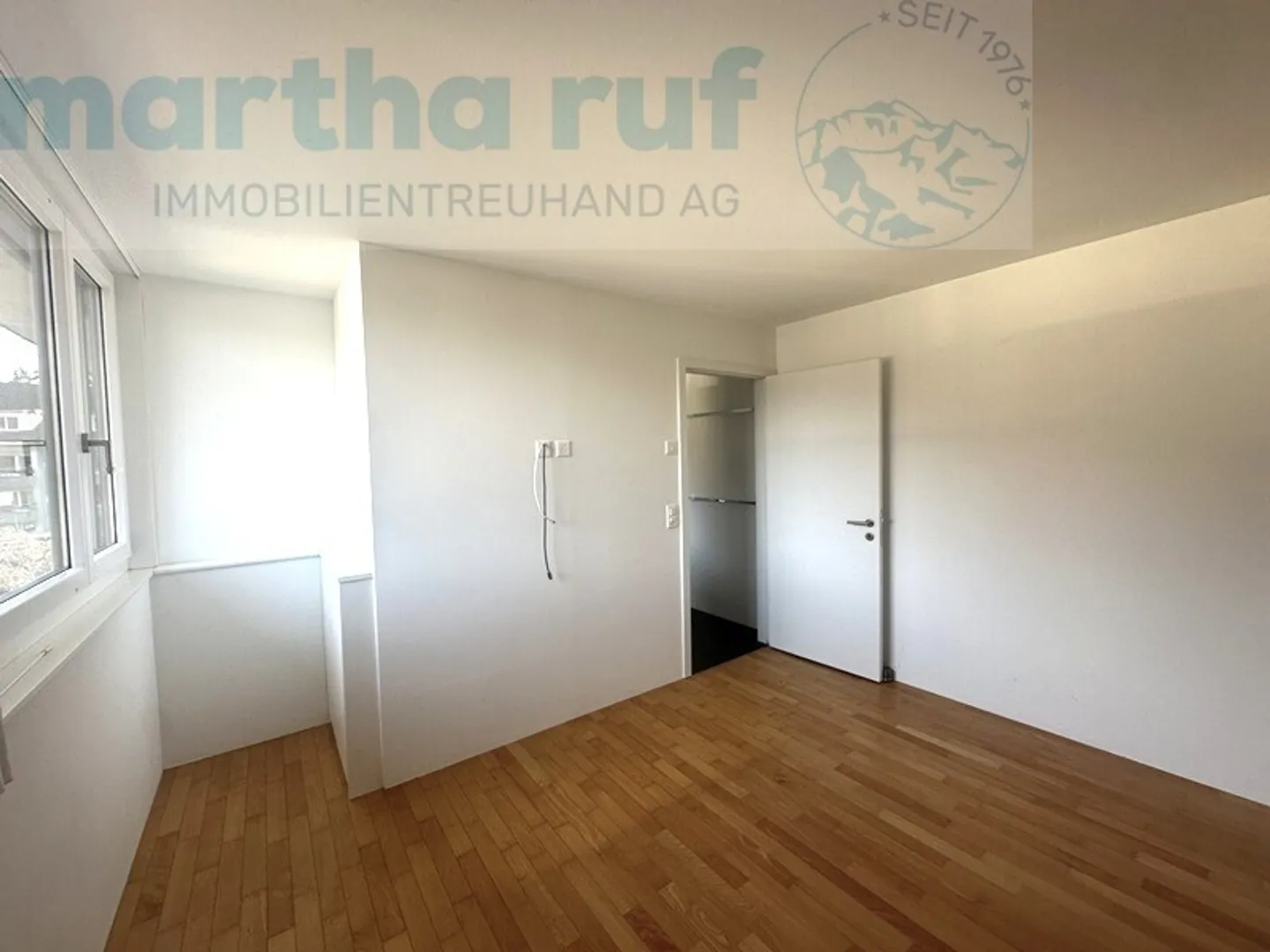Geräumige Wohnung mit Bergsicht - Foto 8 von 14