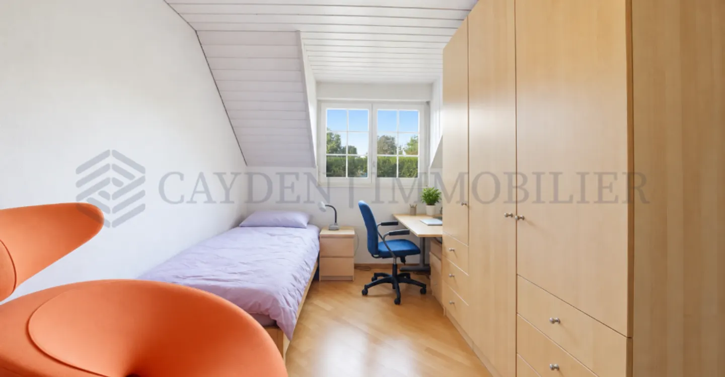 Villa familiale dans un cadre verdoyant - Photo 5 sur 8