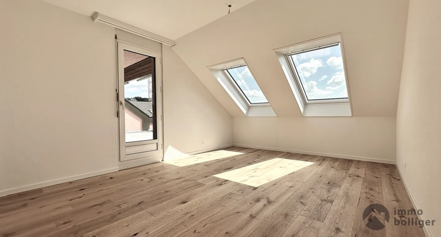 Charmante Dachwohnung - Foto 7 von 14