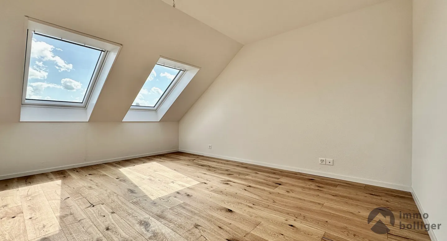 Charmante Dachwohnung - Foto 8 von 14