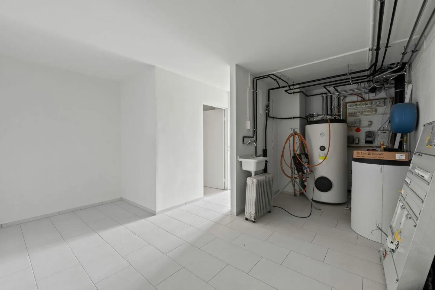 Frisch renoviertes, modernes 4.5-Zimmer-Reihenendhaus mit Garage. - Foto 12 von 17