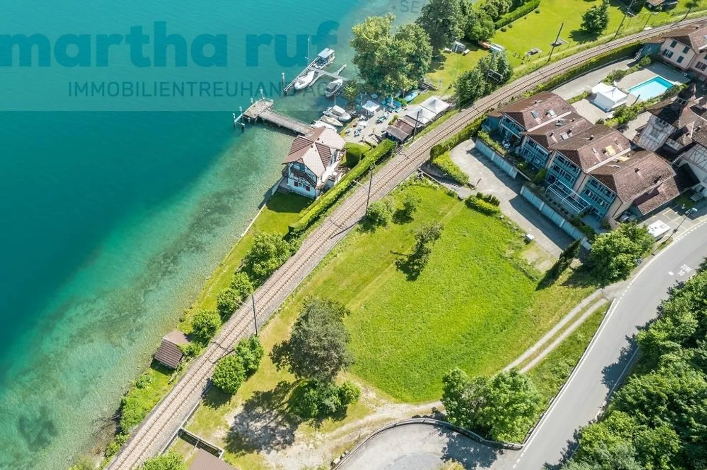 Baulandparzelle mit Seezugang - Foto 5 von 11