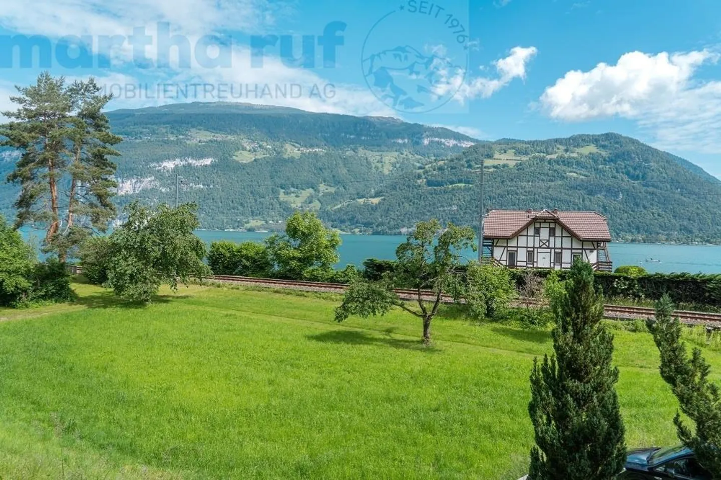 Baulandparzelle mit Seezugang - Foto 6 von 11