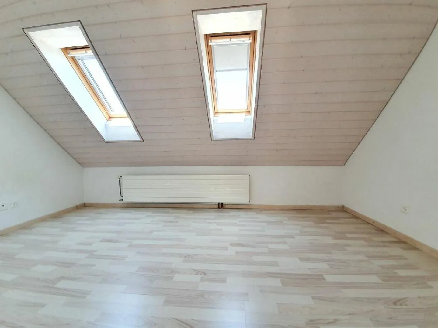 Charmante Dachwohnung in ruhiger Lage - Foto 5 von 11