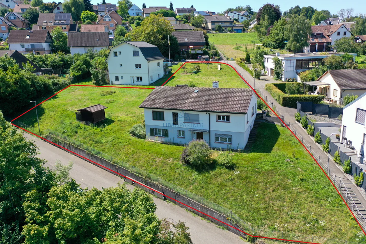 Terreno edificabile con progetto approvato per MFH & DEFH a Giebenach - Foto 1 di 2