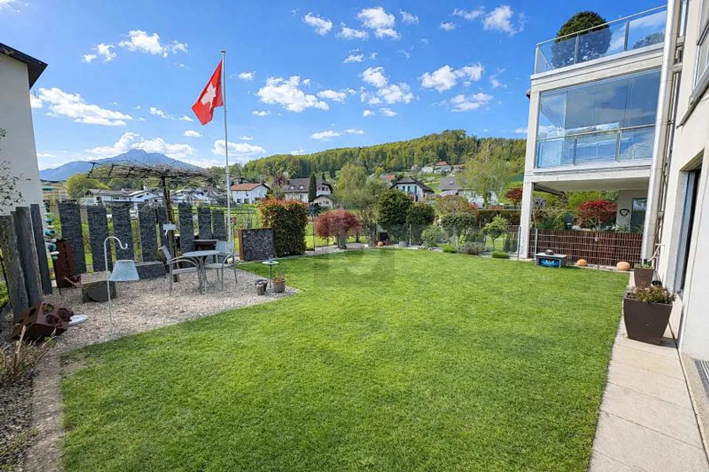 HIGH QUALITY WITH LARGE GARDEN AND PATIO - Photo 2 of 6