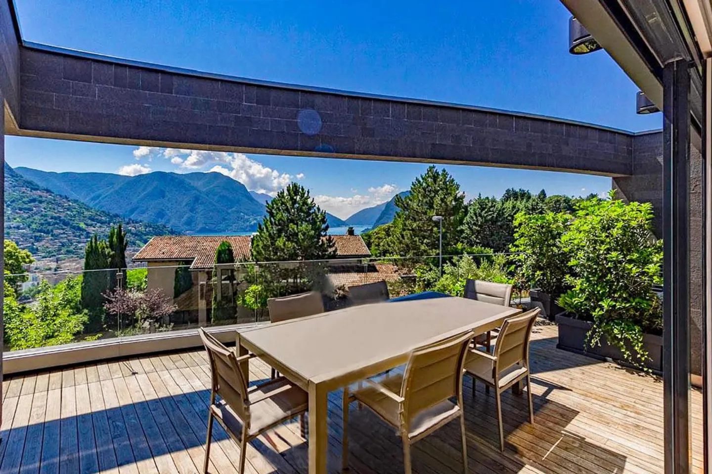 «Grande e prestigioso attico vista lago a Porza» - Foto 2 di 6
