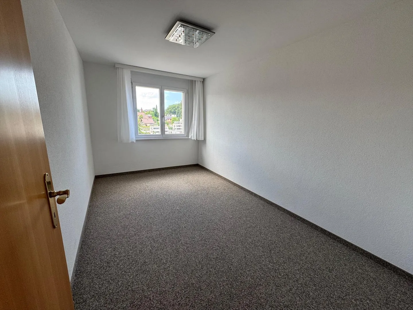 Incantevole appartamento giardino 3,5 locali con grande patio - Foto 8 di 13