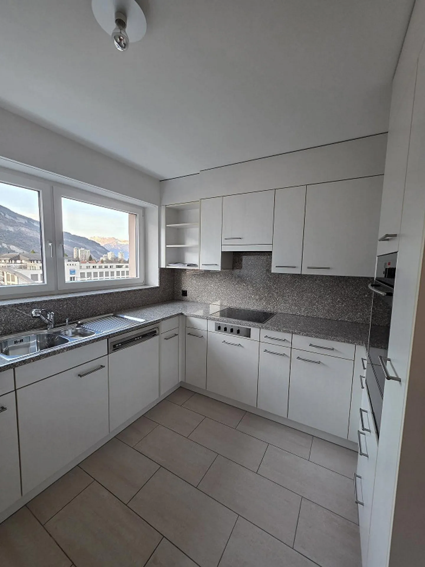 Zentrale Attikawohnung in Chur - Foto 4 von 10