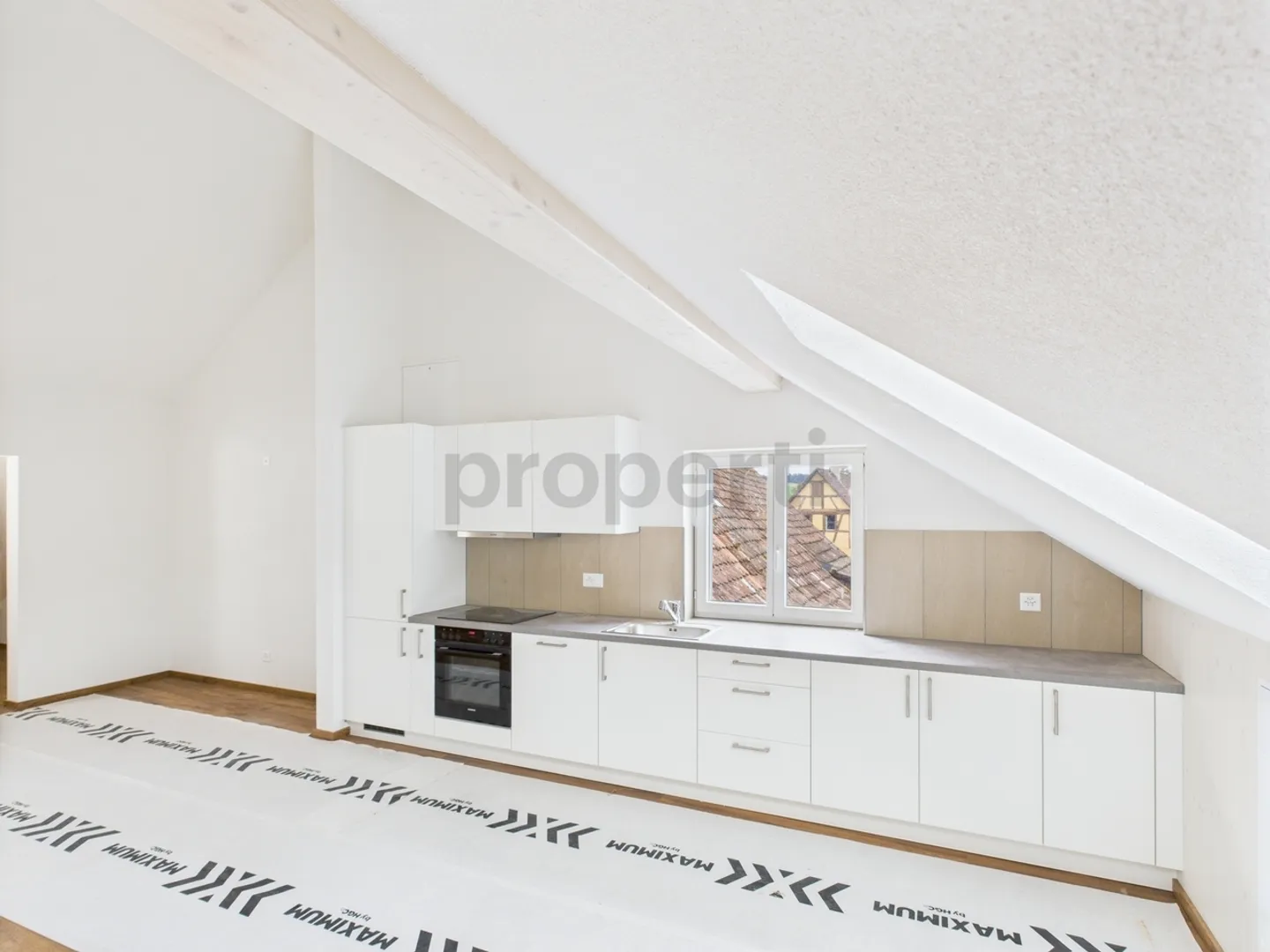 Modern 3.5-room attic apartment in Schleitheim, SG - Photo 5 of 13