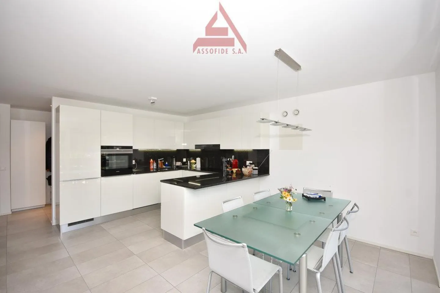 Appartement de 4.5 pièces - Photo 2 sur 6