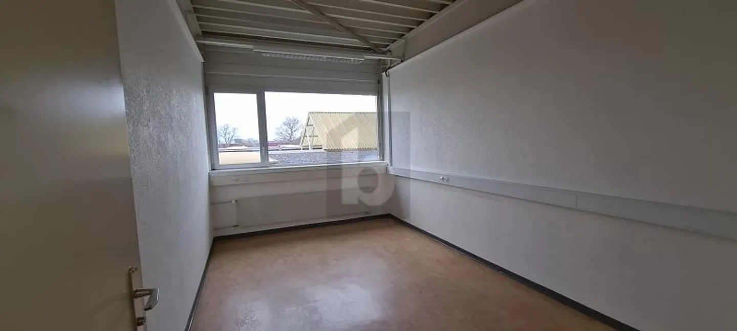 SPACIOUS, IN INDUSTRIAL ZONE - Photo 1 of 5