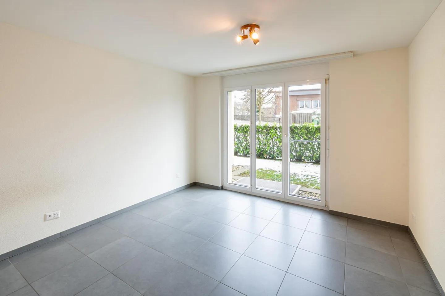 Freundliche Gartenwohnung mit beheiztem Wintergarten - Foto 11 von 16