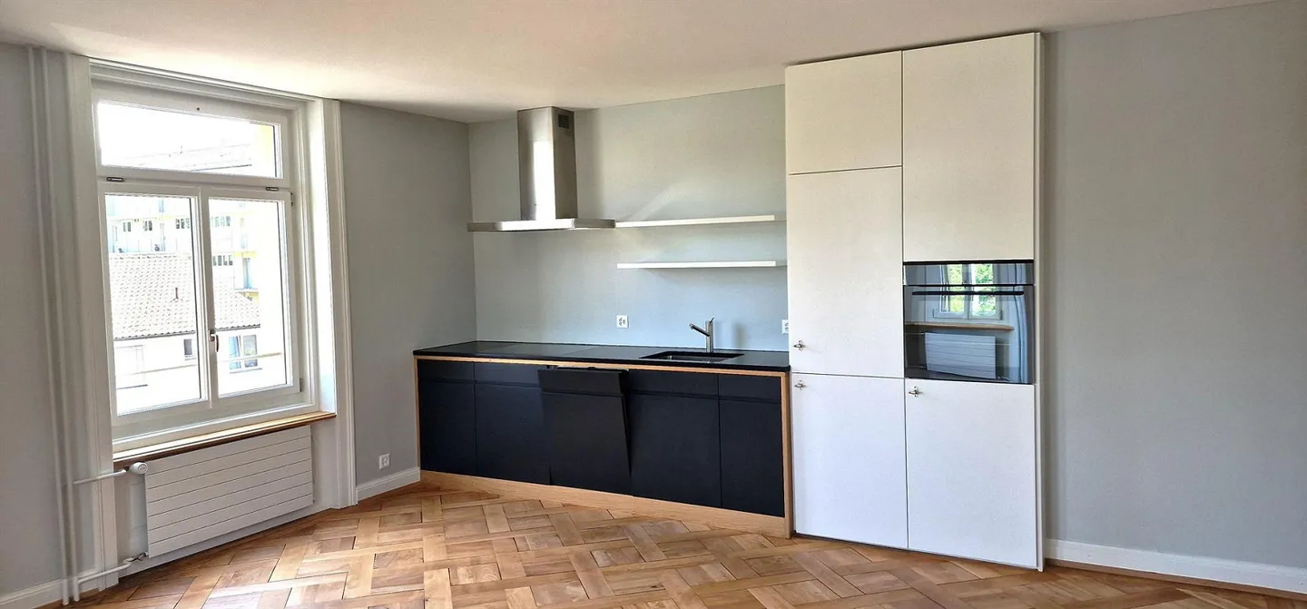 Appartamento moderno di 2,5 stanze con atmosfera storica - Foto 1 di 11