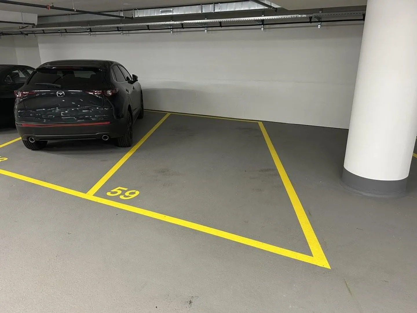Espaces de stationnement spacieux à louer à Wiedikon - Photo 7 sur 8