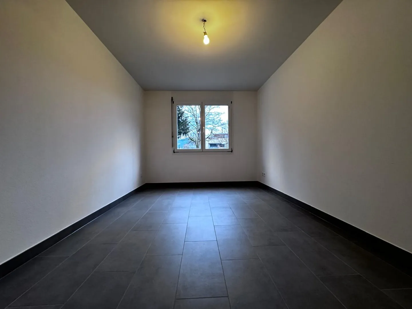 Spacious 4½-room apartment with terrace and two underground parking spaces - Photo 13 of 28