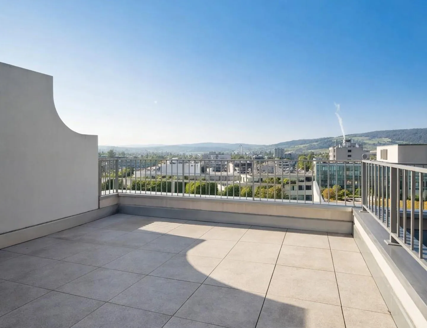 Above the rooftops of Geroldswil - Photo 1 of 13