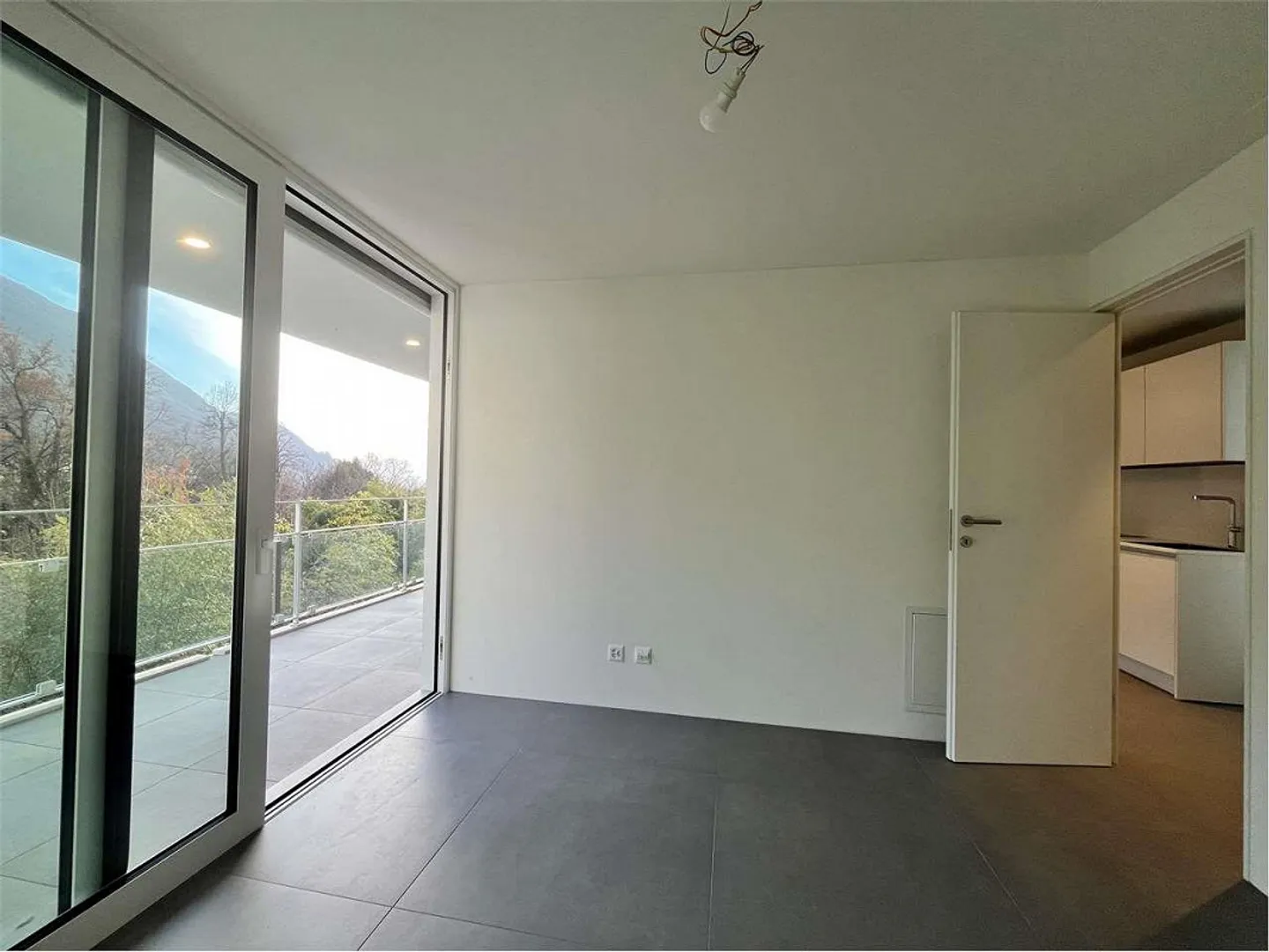 Elegante 2.5 locali con posto auto coperto - Foto 9 di 13