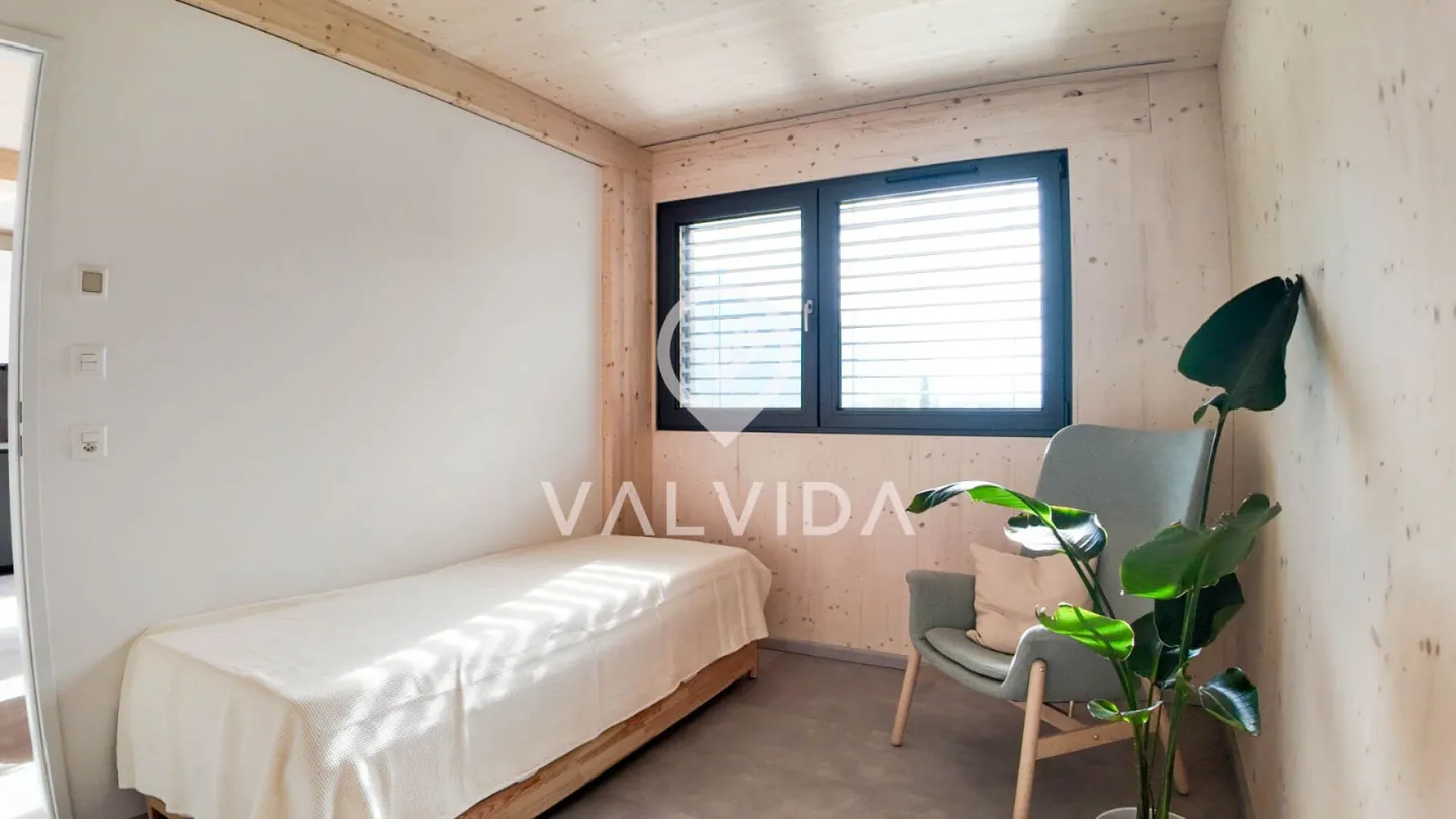 Appartamento 2.5 locali con balcone, posto auto e cantina - Foto 5 di 9