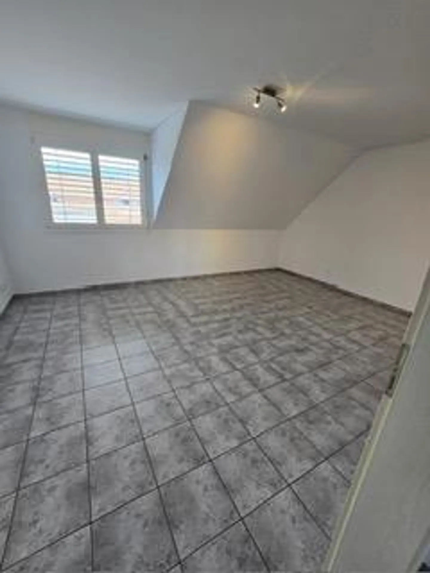 Appartement sous les combles de 3,5 pièces - Photo 4 sur 5