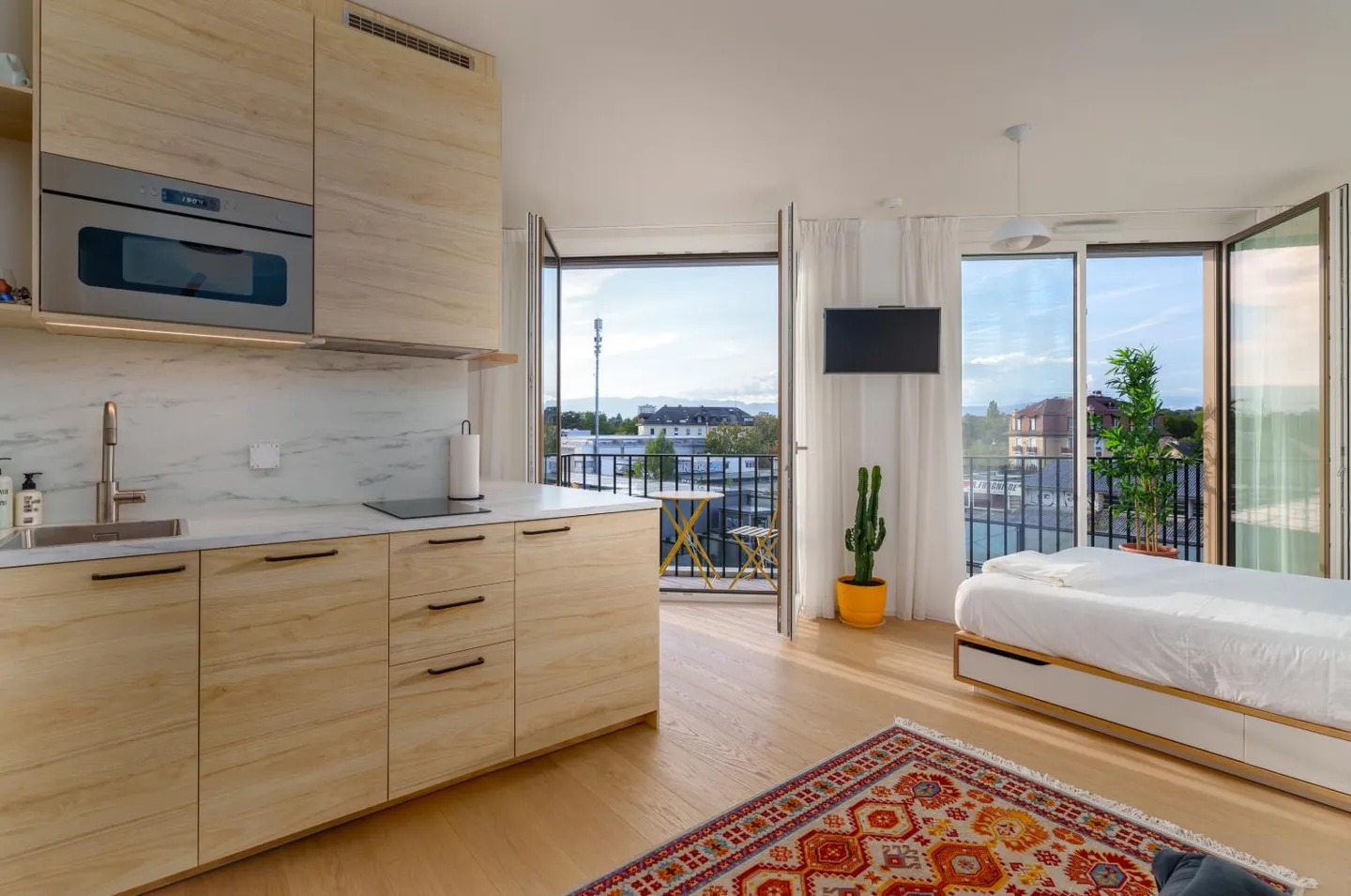 Modernes Studio nahe Bahnhof Chêne-Bourg - Foto 1 von 10