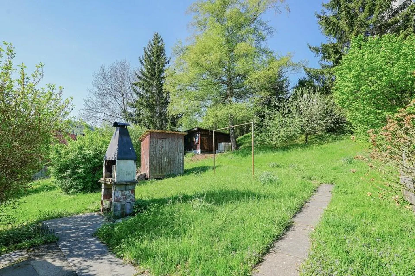 Maison bifamiliale avec jardin spacieux au milieu du village - Photo 12 sur 13