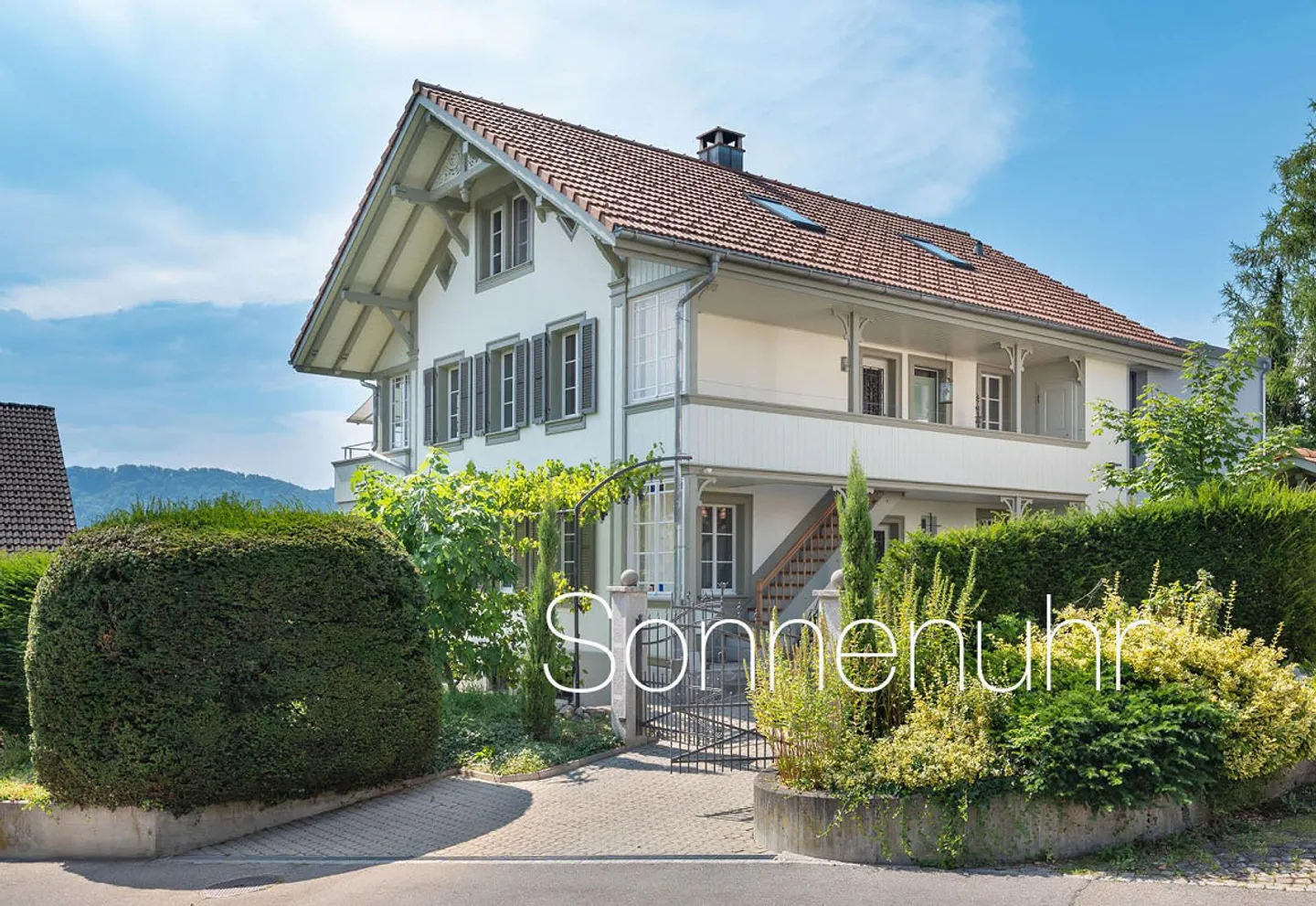 Exclusive two-family house with garden oasis and pool in a preferred location... - Photo 1 of 13