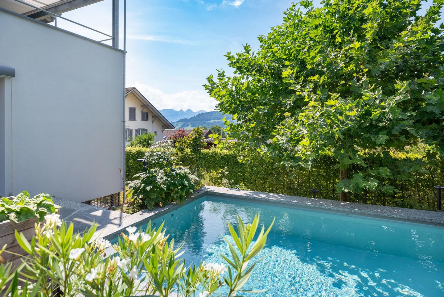 Exclusive two-family house with garden oasis and pool in a preferred location... - Photo 4 of 13