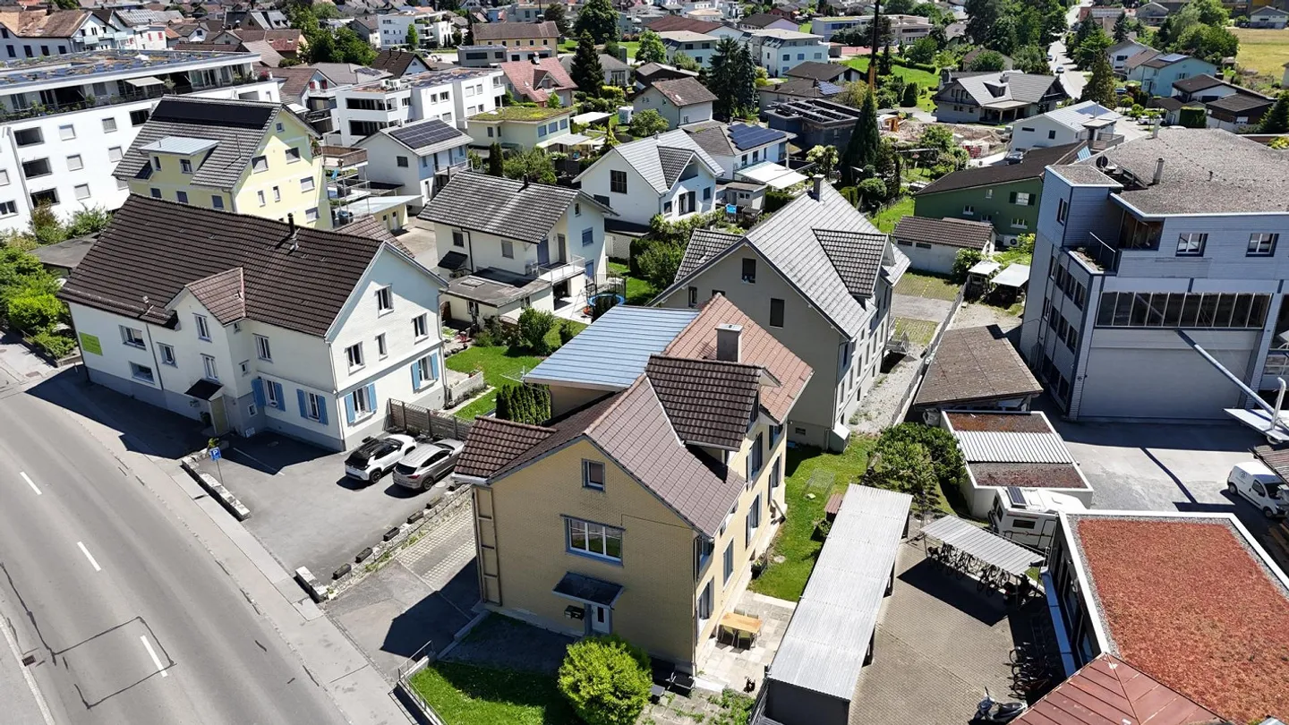 Deux maisons multifamiliales entièrement louées à Rebstein - Photo 4 sur 18