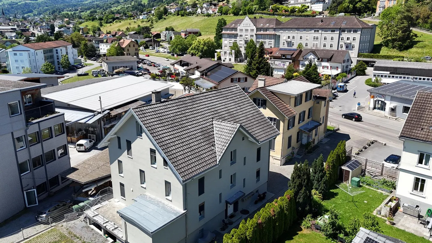 Deux maisons multifamiliales entièrement louées à Rebstein - Photo 5 sur 18